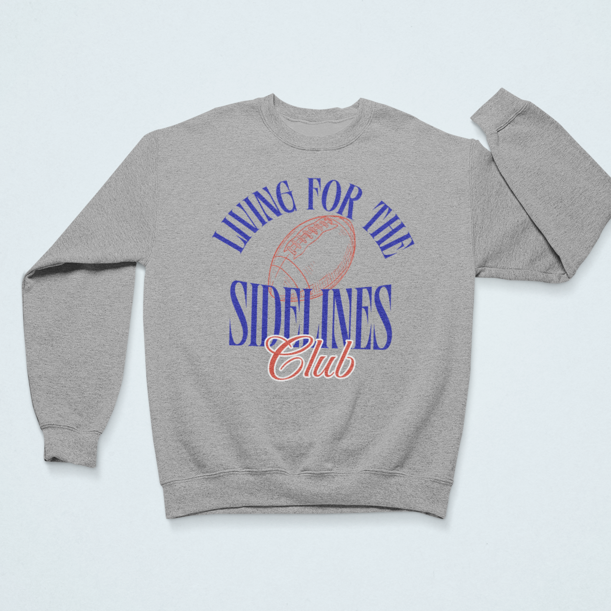 Gray cozy sweatshirt with the text "Living for the Sidelines Club" featuring a sketched football graphic, perfect for football fans or sports supporters.