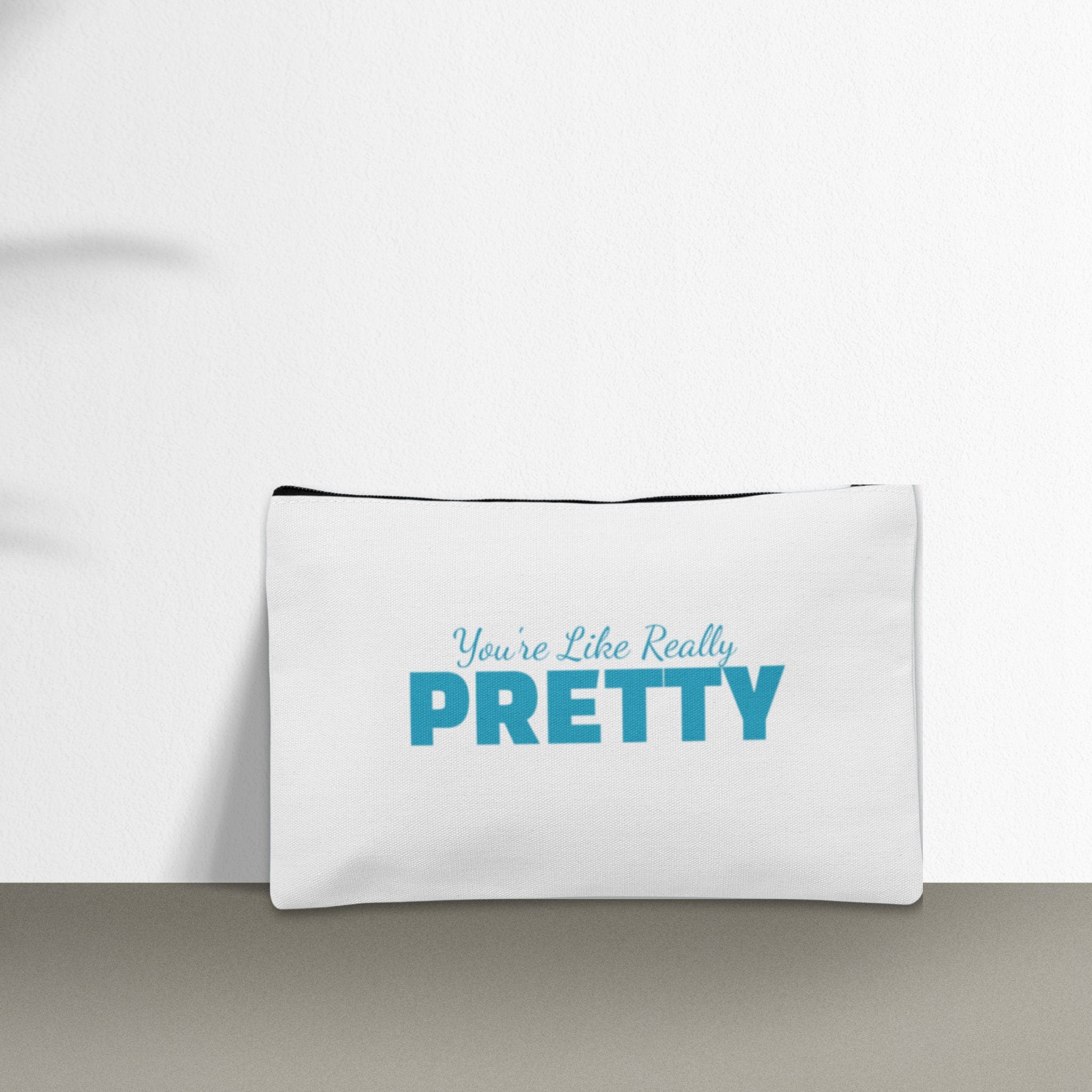 A custom makeup bag with the phrase 'You're Like Really Pretty,' making it a funny and charming gift for women. Ideal for those seeking unique and personalized cosmetic bags.