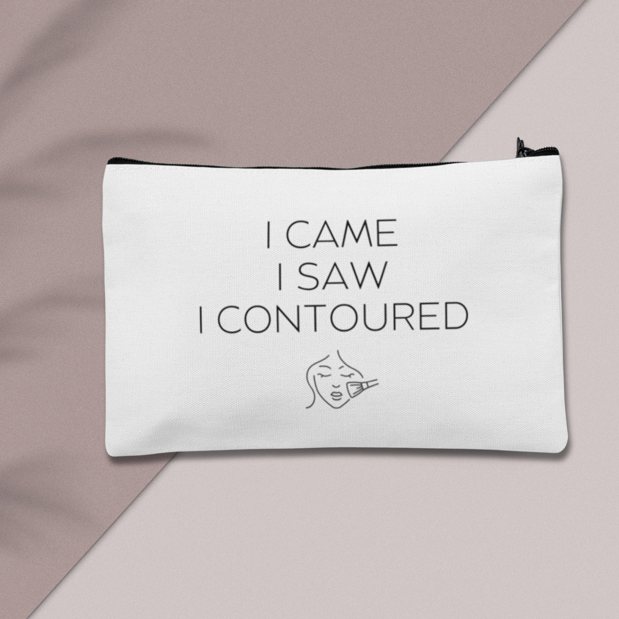 A custom makeup bag with the phrase 'I Came I Saw I Contoured,' making it a funny and stylish gift for women. Perfect for those looking for unique and personalized cosmetic bags.