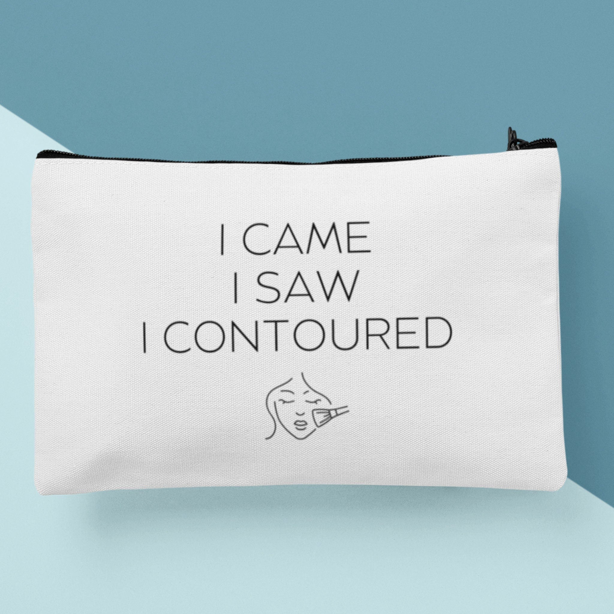 A custom makeup bag with the phrase 'I Came I Saw I Contoured,' making it a funny and stylish gift for women. Perfect for those looking for unique and personalized cosmetic bags.