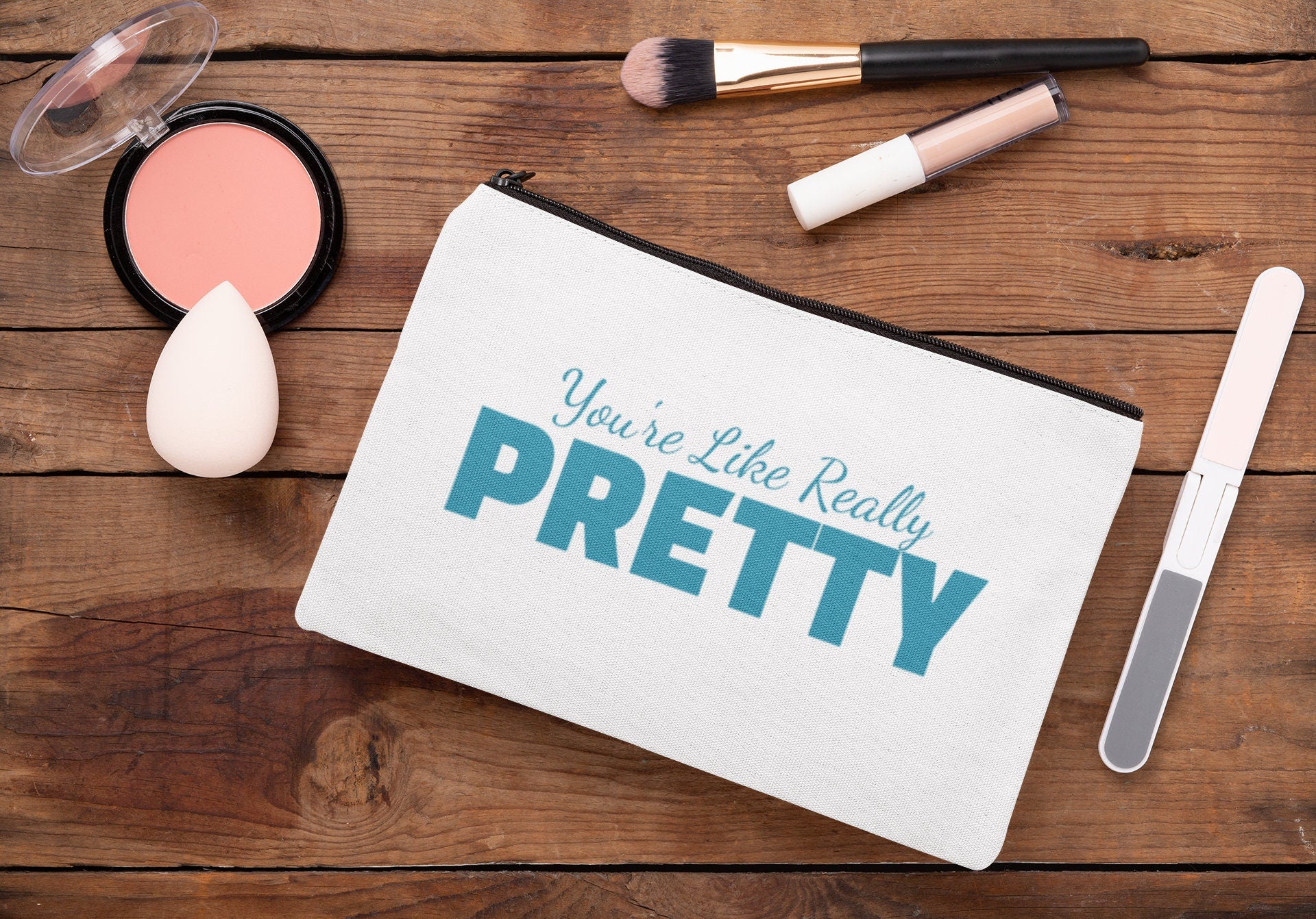 A custom makeup bag with the phrase 'You're Like Really Pretty,' making it a funny and charming gift for women. Ideal for those seeking unique and personalized cosmetic bags.