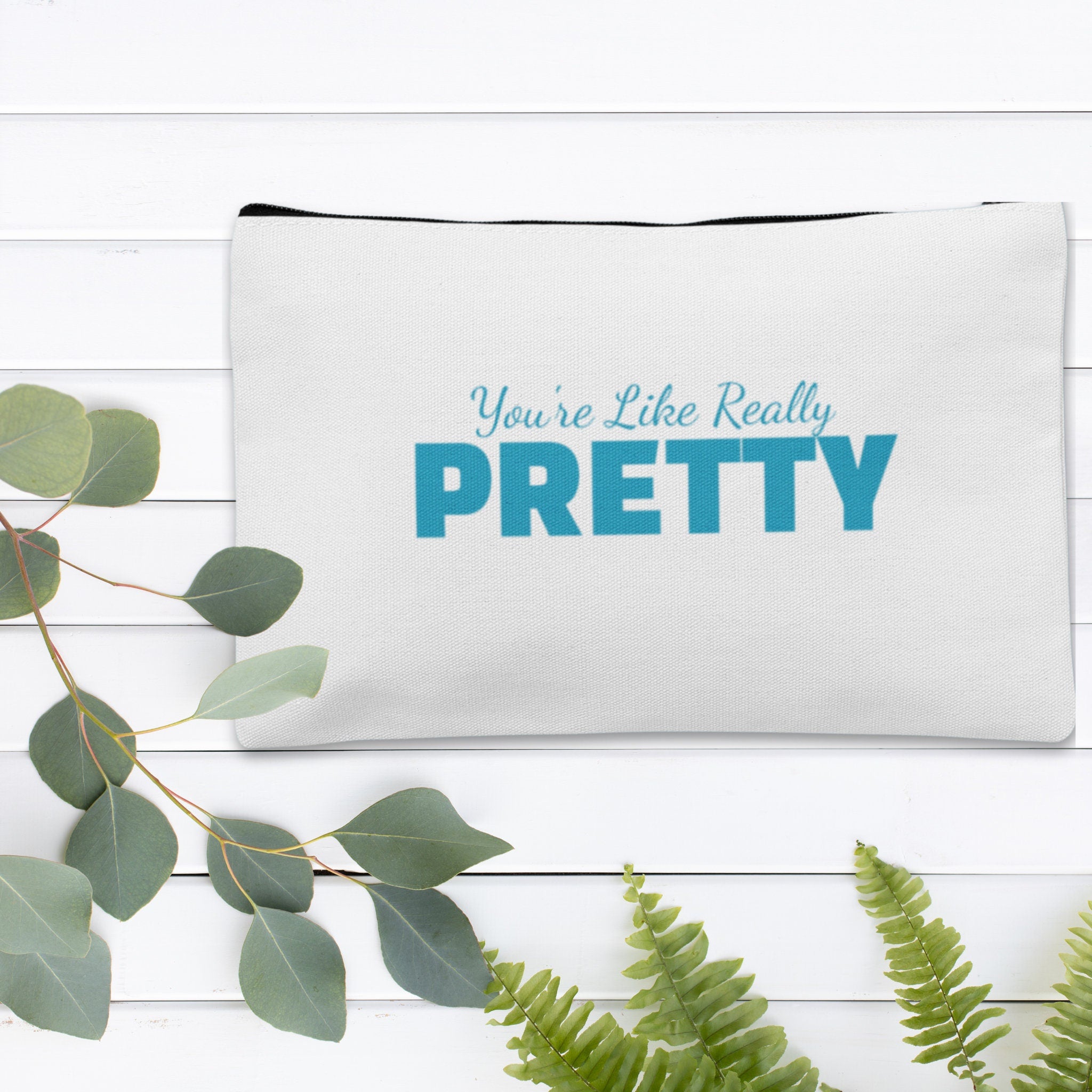 A custom makeup bag with the phrase 'You're Like Really Pretty,' making it a funny and charming gift for women. Ideal for those seeking unique and personalized cosmetic bags.