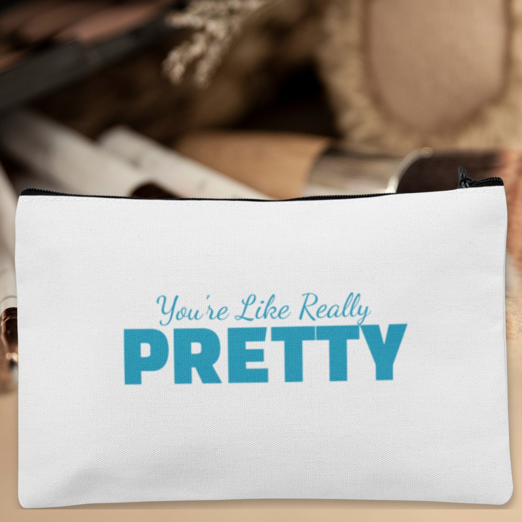 A custom makeup bag with the phrase 'You're Like Really Pretty,' making it a funny and charming gift for women. Ideal for those seeking unique and personalized cosmetic bags.