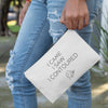 A woman holding a custom makeup bag with the phrase 'I Came I Saw I Contoured,' making it a funny and stylish gift for women. Perfect for those looking for unique and personalized cosmetic bags.